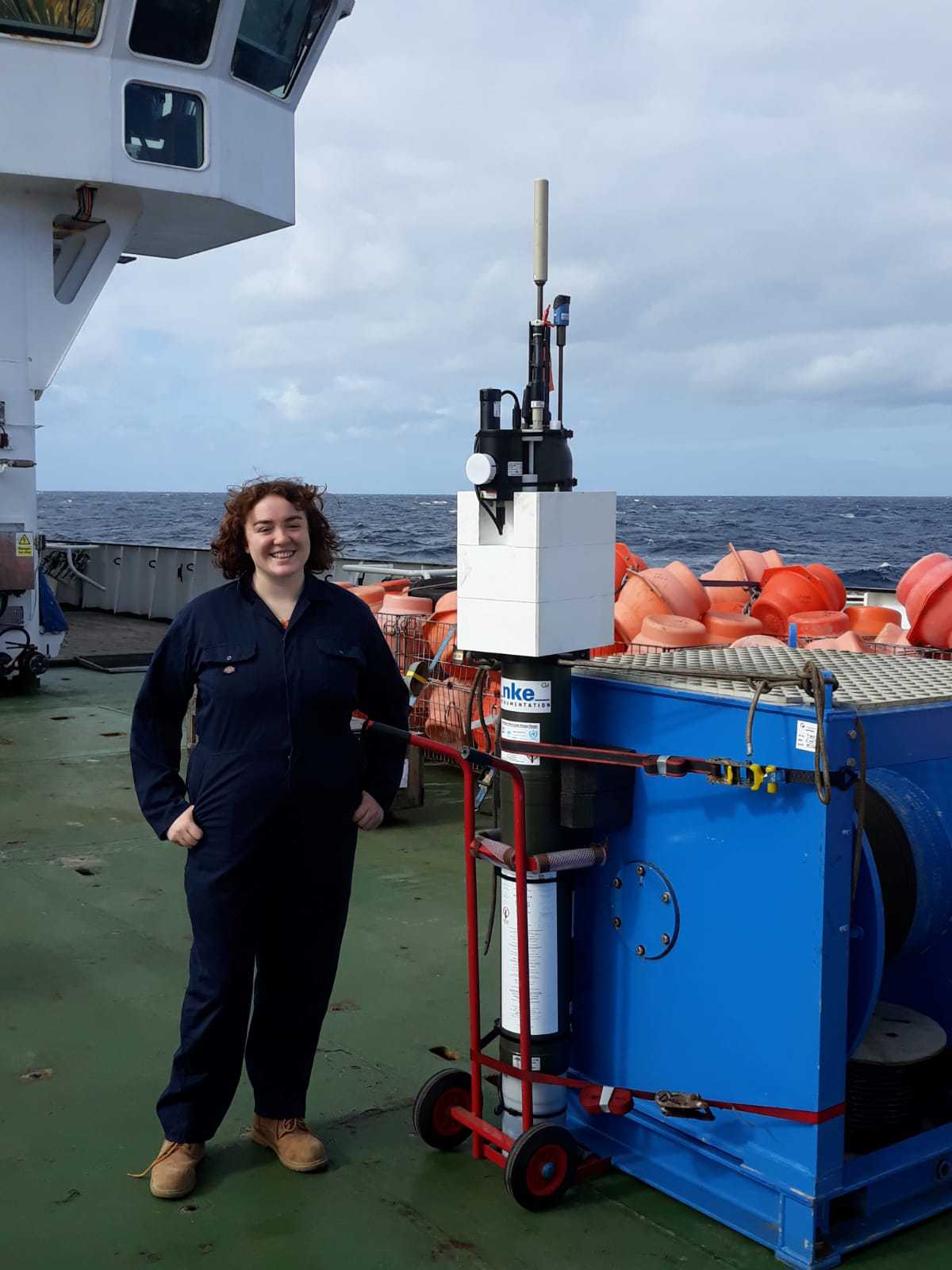 PhD student Clara Douglas on board the RRS Discovery with the Argo float