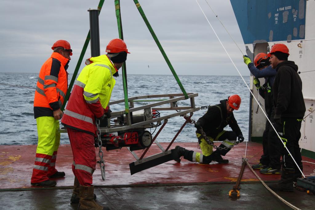 A FluxCAM marine snow camera system being deployed