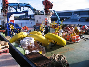 The aft deck of the RRS Discovery loaded with the scientific equipment