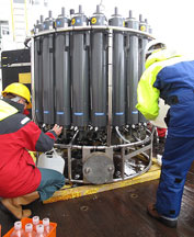 Collecting more water from the CTD Niskin bottles