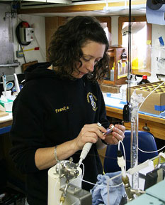 Frances in the lab, preparing to analyse some samples