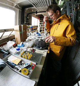 Steve, filtering seawater from the bioassays, to reveal the rate at which phytoplankton are producing DMSP