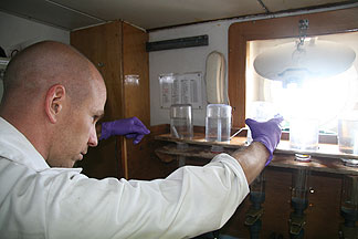 Filtering of the seawater samples to collect particles (mostly phytoplankton cells); the amount of the nitrogen isotope (<sup>15</sup>N) that has been taken up into the particles can then be measured