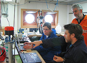 Corinne Pebody, Thanos Gkritzalis and Jon Campbell downloading data from the ocean sensors, with bated breath after one year’s deployment on the mooring!