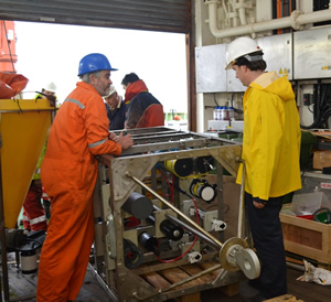 Henry Ruhl and Jon Campbell work on the PAP 1 sensors