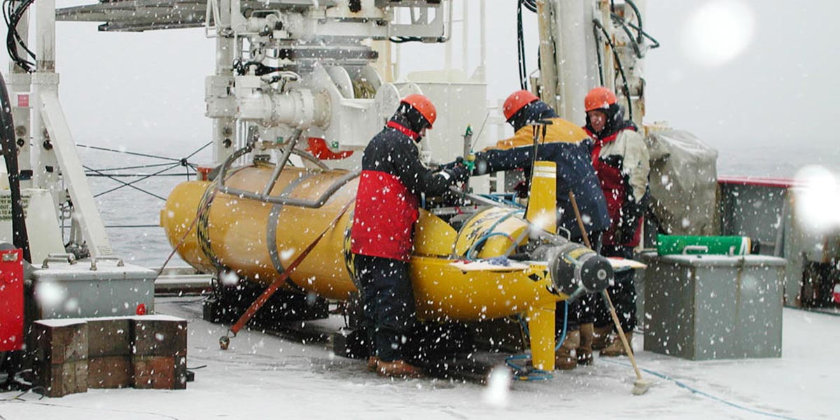 The Autosub team braving the elements on deck in Antarctica!