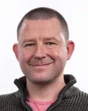 Photograph of Dr Adam Blaker