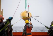 Autosub Long Range (ALR) better known as ‘Boaty McBoatface’ being lowered into water. Image credit: Hannah Wyles (University of St Andrews)