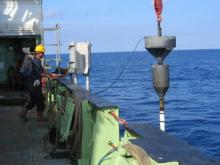 Extracting a core from the seabed. Credit Russell Wynn.