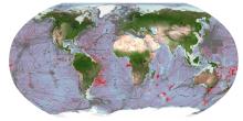Global seafloor areas considered mapped in the GEBCO grid. Grey: mapped areas in the 2021 release. Red: additional coverage in the 2022 release. <em>Image: Nippon Foundation-GEBCO Seabed 2030 Global Center (GDACC) on behalf of Seabed 2030.</em>