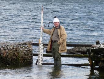 David Pugh doing what he enjoyed most – making temporary sea level measurements (in the Falkland Islands in 2009). Photograph by Philip Woodworth.