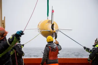 Autosub Long Range (ALR) better known as ‘Boaty McBoatface’ being lowered into water. Image credit: Hannah Wyles (University of St Andrews)