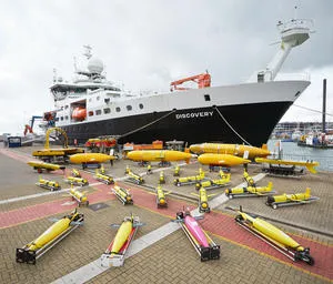 RRS Discovery with some of NOC’s autonomous vehicles in the foreground