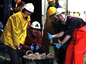 Nina, Alex, Lenka, Colette and Zan being very excited about a bucket full of deep-sea creatures