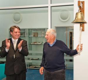 Prof Walter Munk rings the bell from RRS Charles Darwin