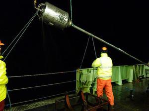 Gravity core being deployed at night off South Georgia