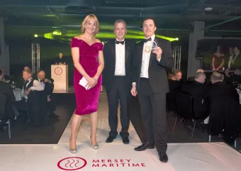 Marlan MD Alex Sinclair collects the award