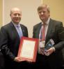 Geraint West receives the 'International Maritime Partner' award on behalf of NOC