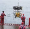 Robot carrying seismic recorder is launched towards the seabed
