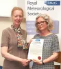 Dr Elizabeth Kent being presented with the Adrian Gill Prize by Professor Joanna Haigh, President of the RMS
